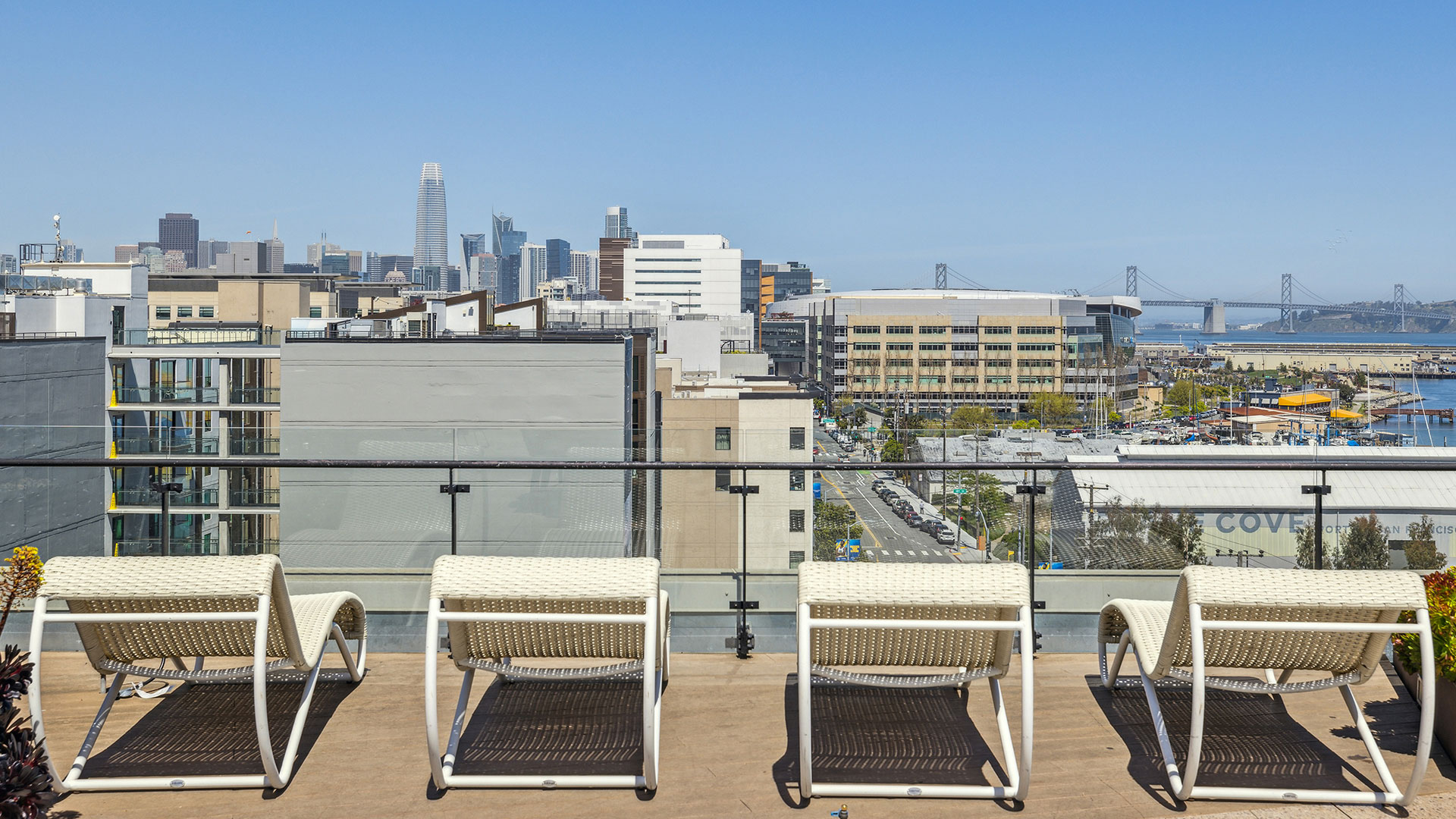 Apartments for Rent Dogpatch- Skylounge Spa With Lounge Chairs and Stunning View of San Francisco Skyline